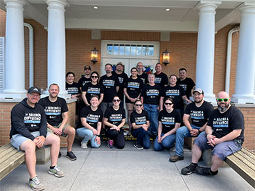 Oshkosh team members volunteer at Fisher House Wisconsin.