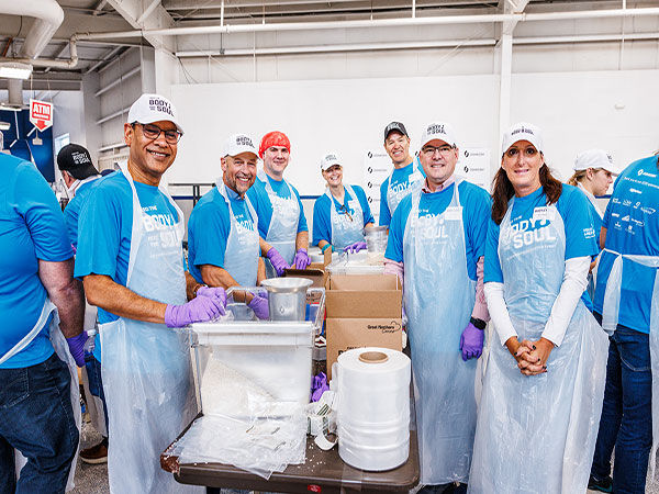 Oshkosh leadership team members at Feed the Body, Feed the Soul 2025