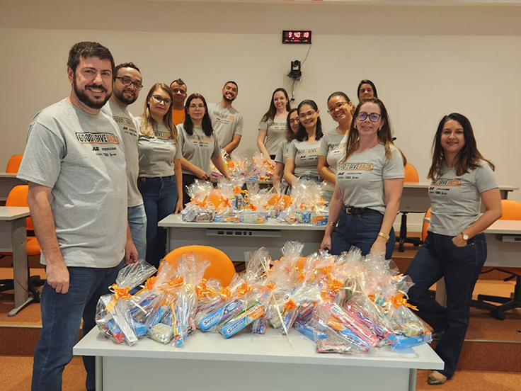 Team members packing hygiene packs