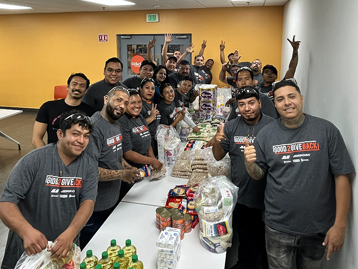 Team members volunteering at food bank