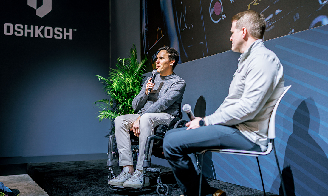 Robert Wickens speaking at Oshkosh booth at CES 2025