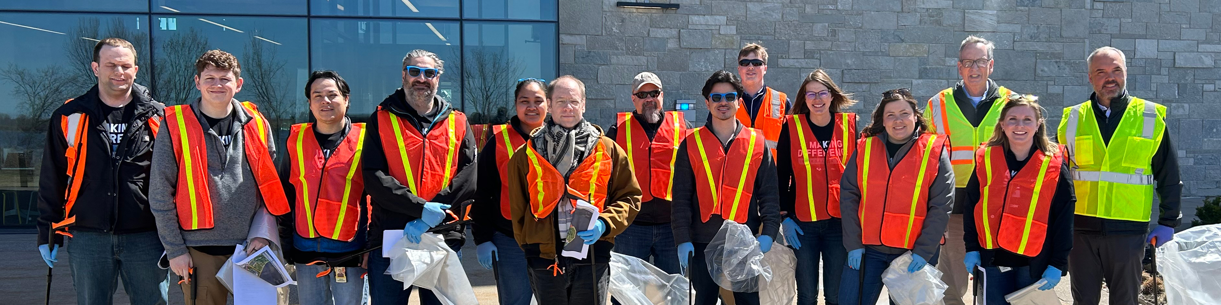Oshkosh team members at GHQ picking up trash