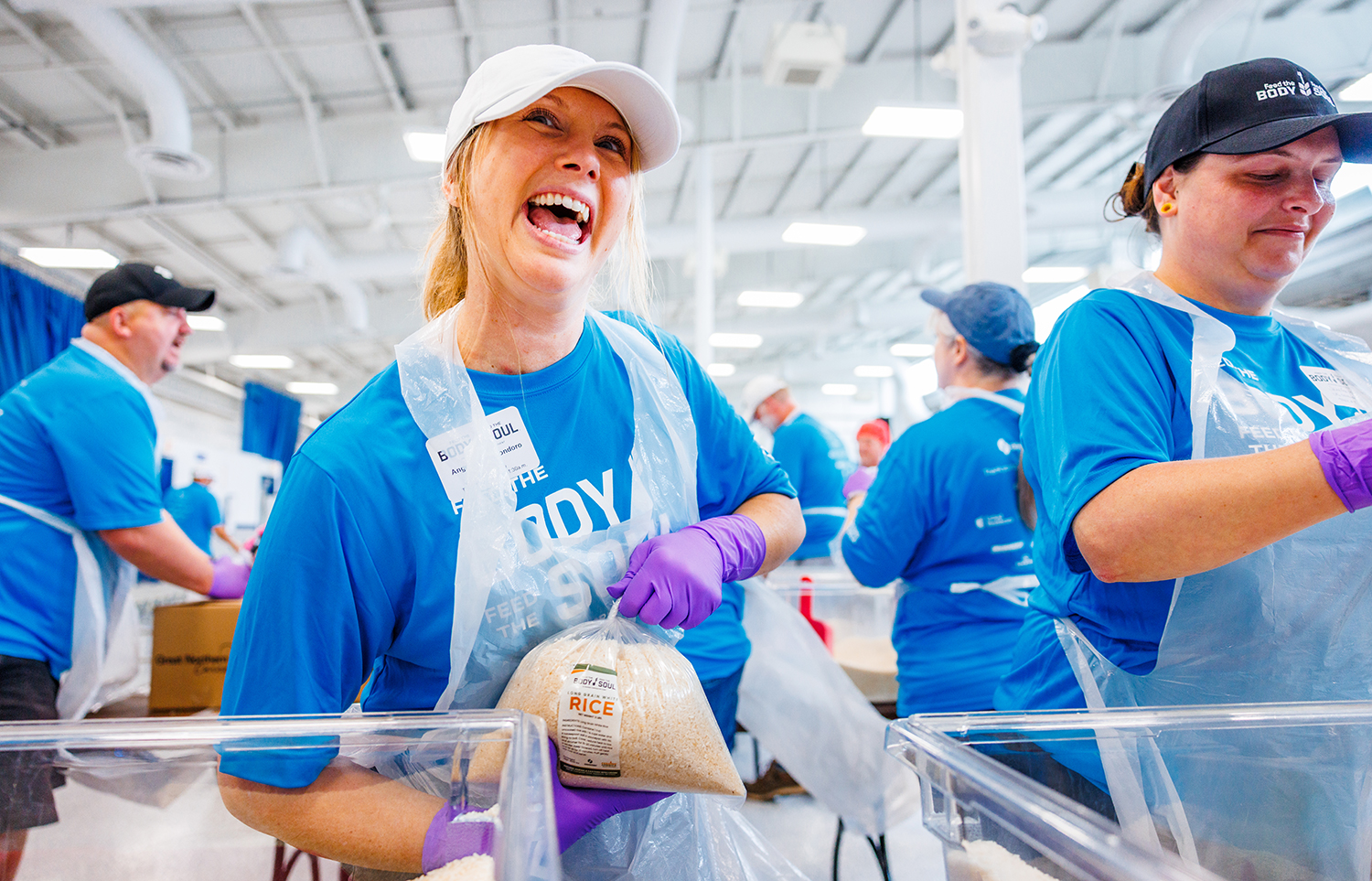 Team member volunteering at Feed the Body, Feed the Soul