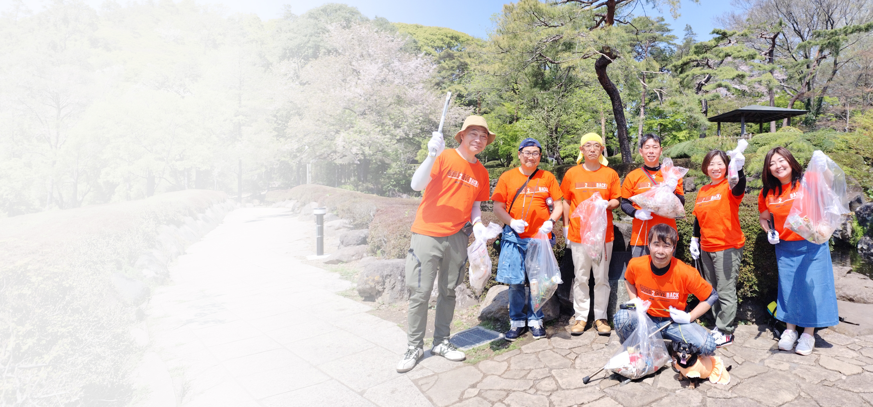 Japan team with bags after cleanup activity